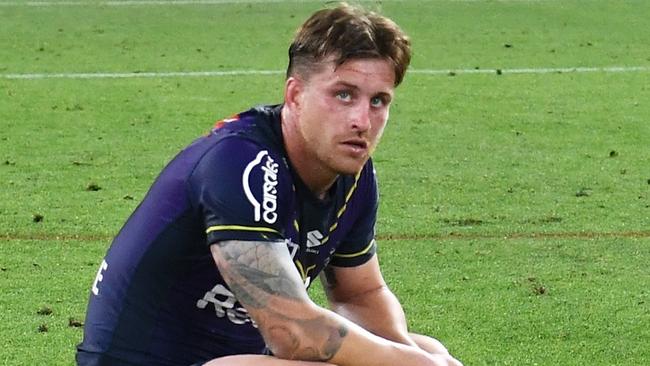 BRISBANE, AUSTRALIA - SEPTEMBER 25: Cameron Munster and Harry Grant of the Storm looks dejected after defeat during the NRL Preliminary Final match between the Melbourne Storm and the Penrith Panthers at Suncorp Stadium on September 25, 2021 in Brisbane, Australia. (Photo by Bradley Kanaris/Getty Images)