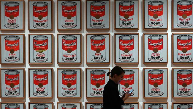 A woman walks past Andy Warhol 