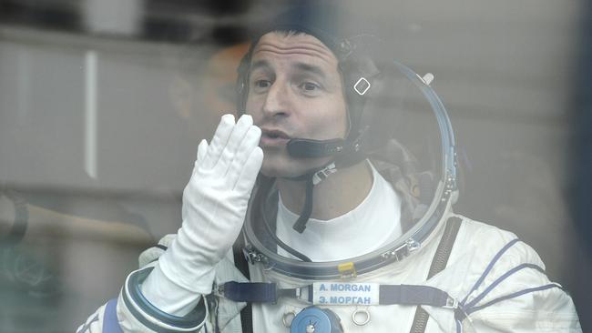 US astronaut Andrew Morgan gestures to his relatives from a bus prior the launch of Soyuz MS-13 space ship. Picture: AP