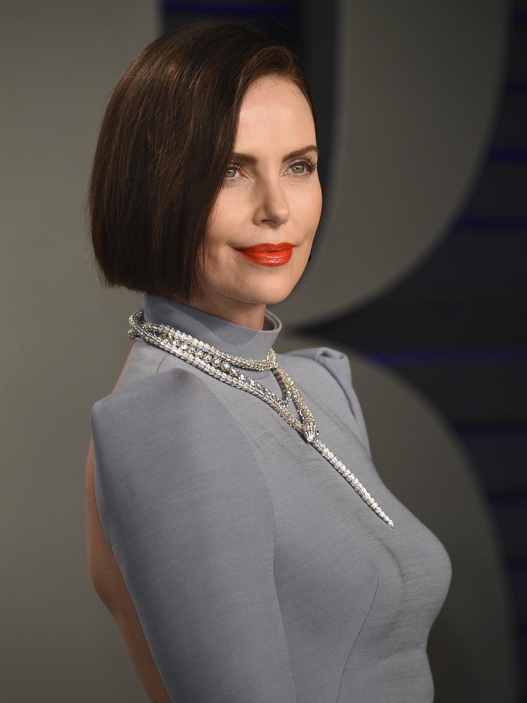 Charlize Theron turns heads as a brunette. Picture: AP