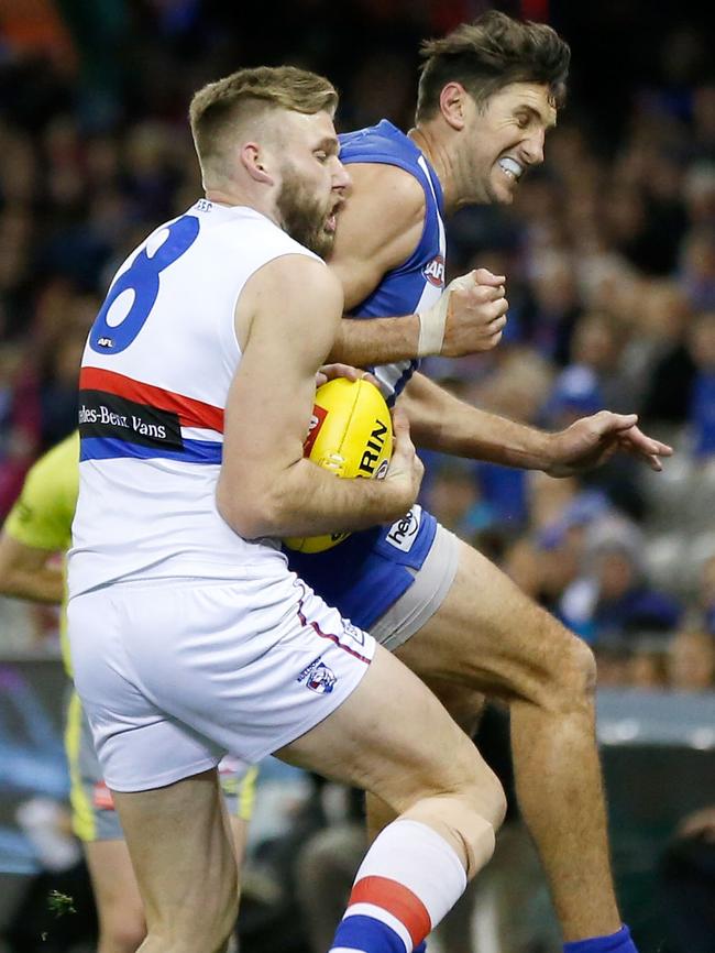 Jarrad Waite hits Jackson Trengove high.