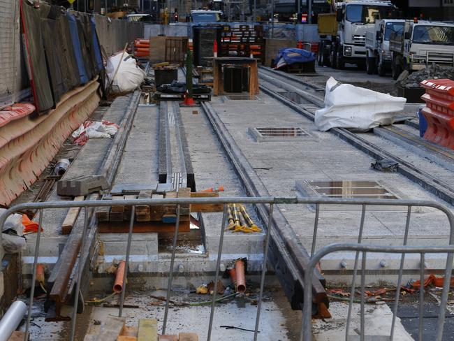 The cost blowout has been partly blamed on the extra utility connections and wires found underground after digging up George Street.