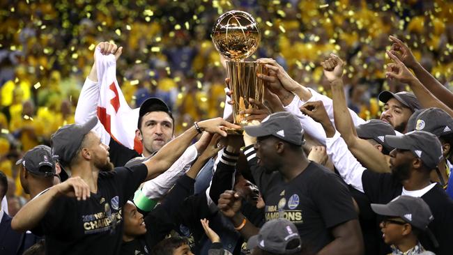 The Warriors celebrate with the Larry O'Brien Championship Trophy. Picture: Getty