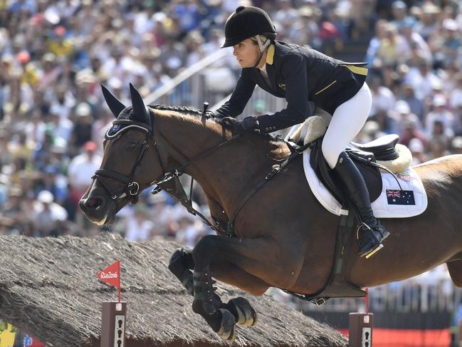 Australia’s Edwina Tops-Alexander on her horse Lintea Tequila competes in the individual equestrian show jumping.