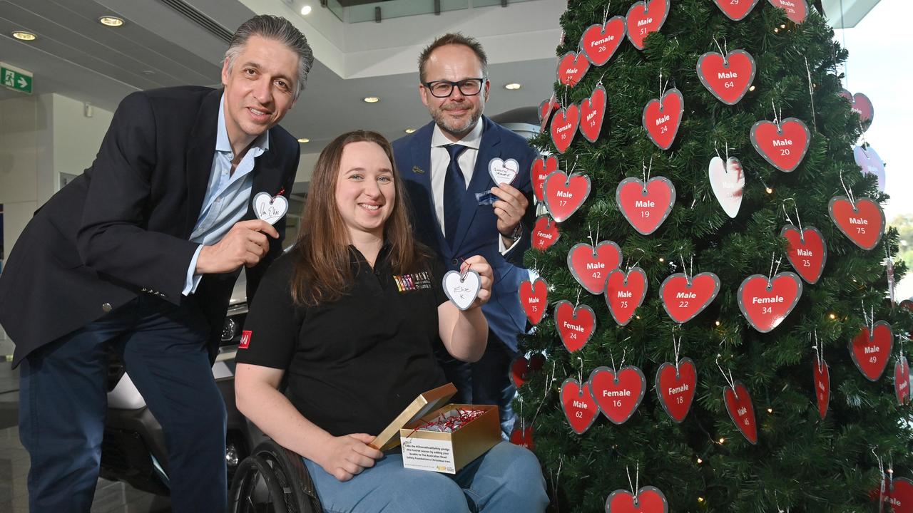 Prof Ellis with Elise Kennedy, who was confined to a wheelchair following a road crash, and director of Australian Road Safety Foundation Quentin Crombie. Picture: Keryn Stevens