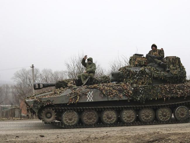 FILE - In this image made from a video distributed by the Russian Defense Ministry Press Service on Friday, March 14, 2025, Russian soldiers ride on a self-propelled gun in Russia's Kursk region. (Russian Defense Ministry Press Service via AP, File)