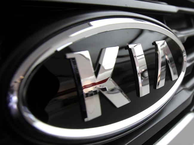 Kia Motors Corp. logo is seen on its car at a showroom in Seoul, South Korea, Friday, April 23, 2010. Kia, South Korea's second-largest automaker, said on Friday net profit quadrupled in the first quarter on stronger sales and equity gains from related companies.(AP Photo/Ahn Young-joon)