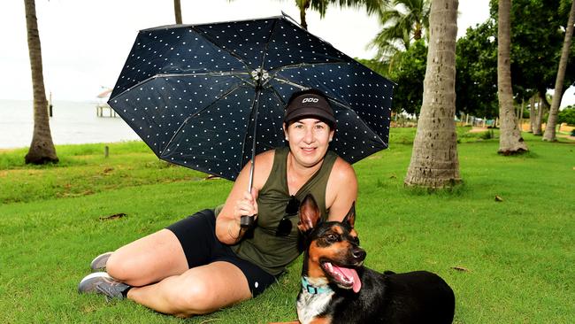 North Ward resident Belinda Johnston with her dog Mickey, a kelpie-cross enjoying a walk along The Strand.