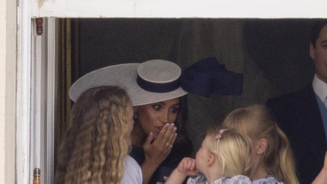 Meghan Markle caught shushing the young royals. Picture: Goffphotos