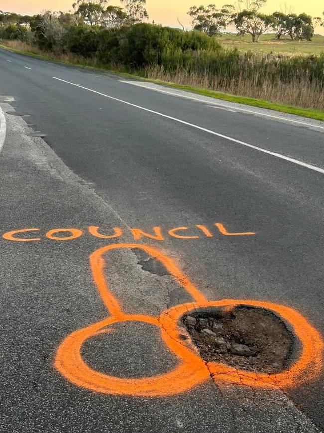 The images of the graffitied pothole sparked attention from a number of users. Picture: Facebook/Nikki Kelly