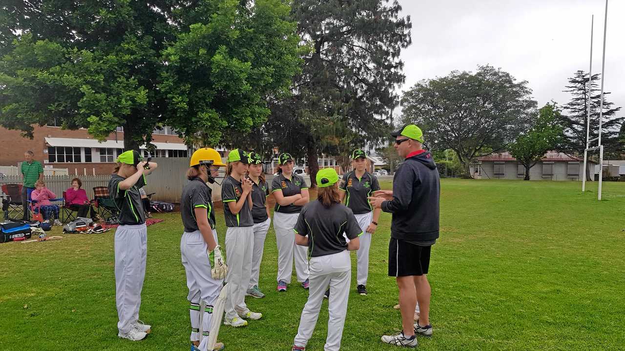 GROWING THE GAME: Coach Anthony Clark gives his players a few last-minute pointers before their match. The Toowoomba Girls Cricket Hub will host a come and try day on August 26. Picture: Contributed