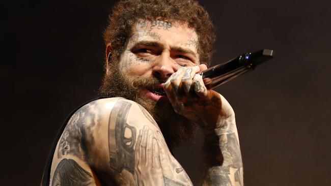 DAILY TELEGRAPH NOVEMBER 29, 2023. Post Malone on stage during his concert at The Domain in Sydney. Picture: Jonathan Ng