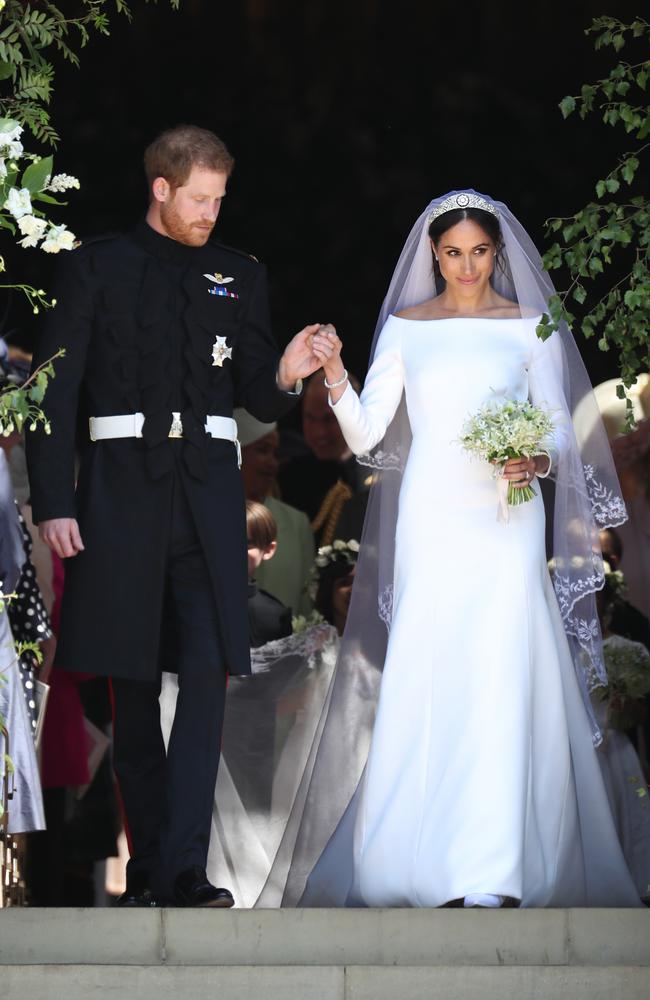 Prince Harry, Duke of Sussex and the Duchess of Sussex Meghan Markle depart after their wedding ceremony at Windsor Castle. Picture: Getty Images