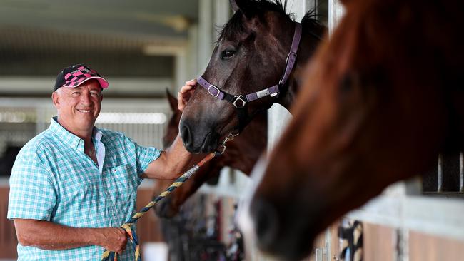 Trainer Robert Heathcote at his Eagle Farm stables with with Zoechelon. Picture: Tara Croser