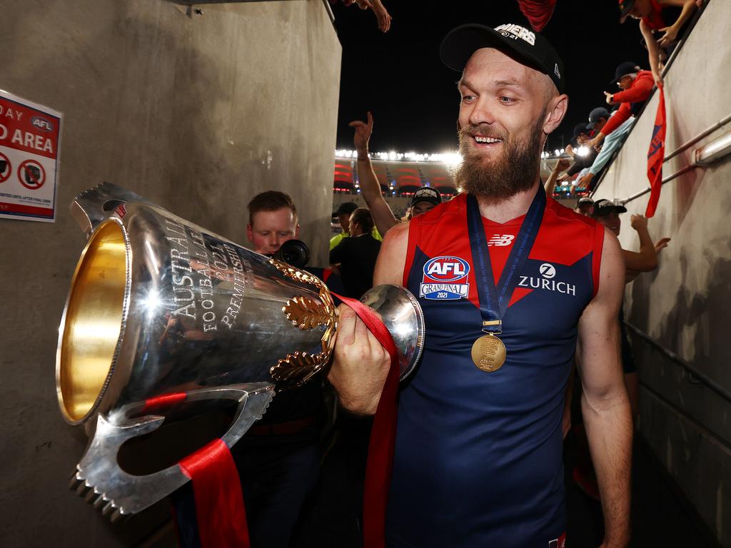 Max Gawn of the Demons heads into the rooms with the premiership cup. Picture: Michael Klein