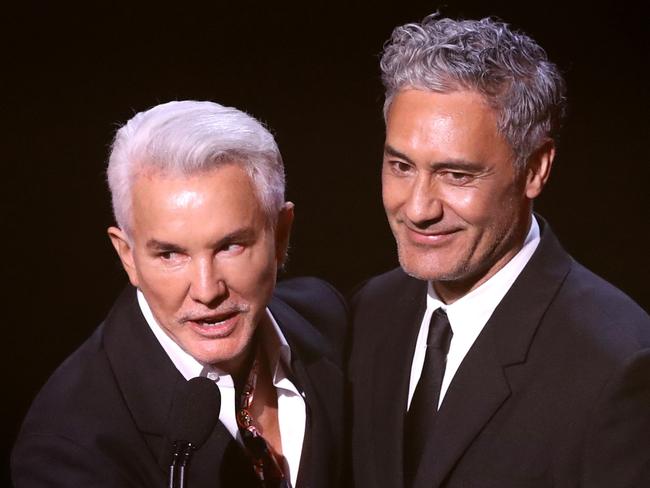 SYDNEY, AUSTRALIA - DECEMBER 08: Baz Luhrmann and Taika Waititi present the AACTA Award for Best Film during the 2021 AACTA Awards Presented by Foxtel Group at the Sydney Opera House on December 08, 2021 in Sydney, Australia. (Photo by Mark Metcalfe/Getty Images for AFI)