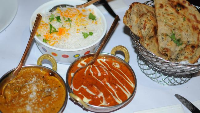 Lamb malabar, butter chicken, pudina parantha (tandoor bread with mint) and saffron basmati rice from Castle Taj Indian Restaurant.