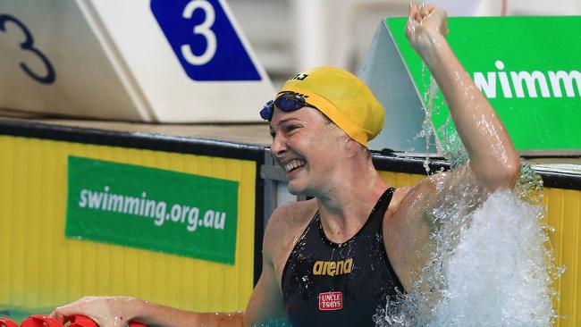 Cate Campbell celebrates after breaking the 100m freestyle world record.