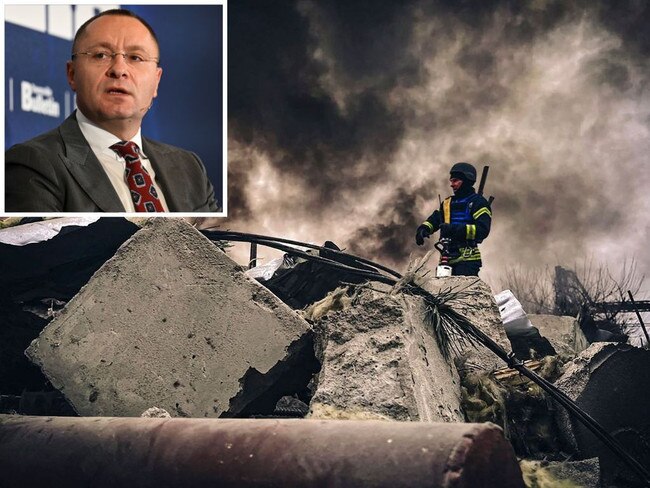 Ukraine's ambassador to Australia Vasyl Myroshnychenko, and a firefighter working at the site of a Russian strike in Brovary, near Kyiv (Picture: Ukraine Emergency Service/AFP)