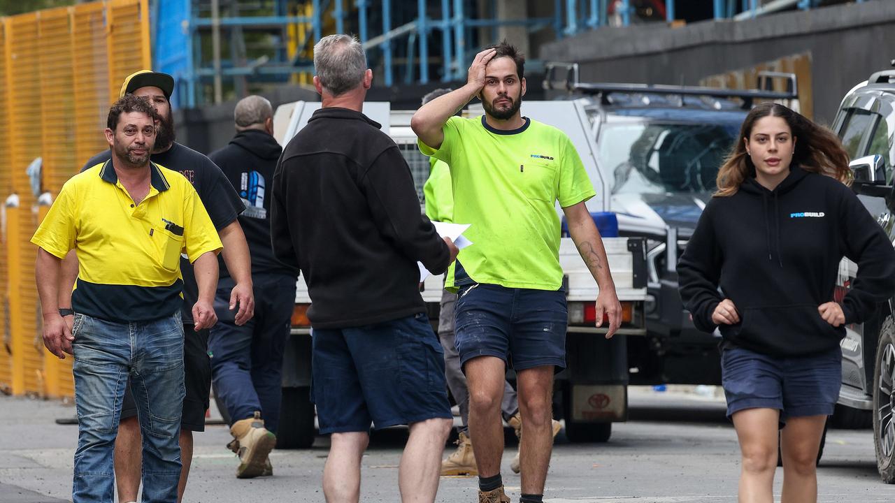 Workers walking of a Probuild construction site.