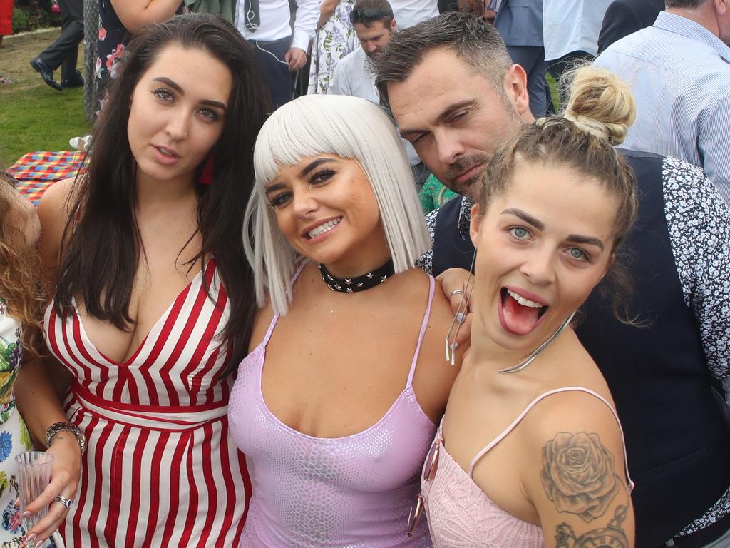 Racegoers are seen during the Lexus Melbourne Cup Day, as part of the Melbourne Cup Carnival, at Flemington Racecourse in Melbourne, Tuesday, November 6, 2018. (AAP Image/Dave Crosling) NO ARCHIVING, EDITORIAL USE ONLY