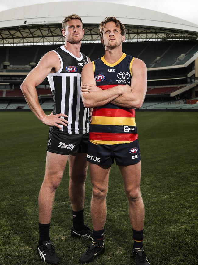 Port Adelaide’s Tom Jonas and Adelaide Crows’ Rory Sloane at Adelaide Oval in April. Picture: Sarah Reed