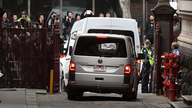 Cardinal Pell is driven away in a white prison van after his failed appeal. Picture: AFP