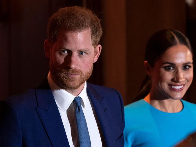 (FILES) In this file photo taken on March 05, 2020 Britain's Prince Harry, Duke of Sussex (L), and Meghan, Duchess of Sussex leave after attending the Endeavour Fund Awards at Mansion House in London. - Britain's Prince Harry and his wife Meghan will co-chair a fundraising concert urging more vaccinations that will air May 8, which the Bidens will also participate in, event organizers announced April 28, 2021. (Photo by JUSTIN TALLIS / AFP)