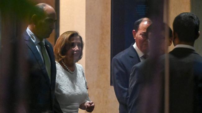 Speaker of the US House of Representatives Nancy Pelosi leaves the Shangri-La Hotel after a reception organised by the American Chamber of Commerce in Singapore on Monday. Picture: AFP