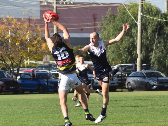 Lake Wendouree's Ben Hayes takes a strong mark against Melton South. Picture: Lake Wendouree Football Club.