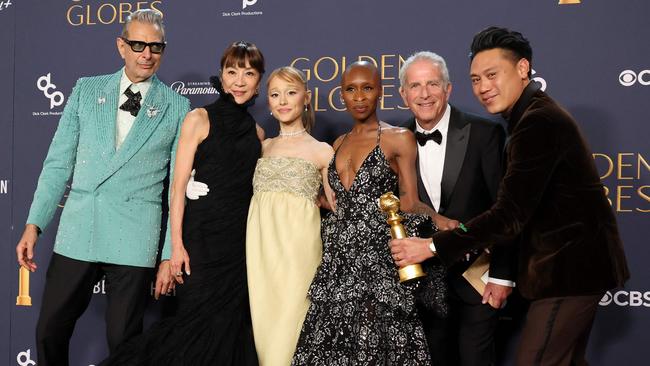 Jeff Goldblum, Michelle Yeoh, Ariana Grande, Cynthia Erivo, Marc Platt, and Jon M. Chu, winners of the Cinematic and Box Office Achievement award for Wicket. Picture: AFP