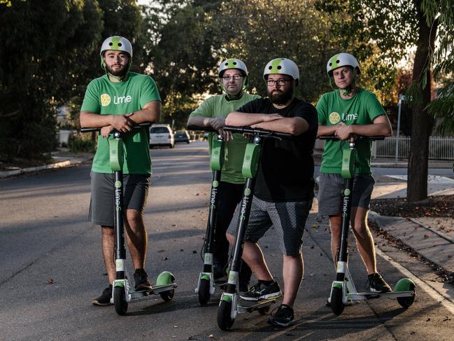 Lime Scooter staff Ali Bayati, Tim Kelly, Jeff Roberts and Zak Bishop outside their warehouse on April 14 – their final day of Lime’s operation. <span id="U65880244857uMD" style="text-transform:uppercase;">Picture: AAP/Morgan Sette.</span>                     