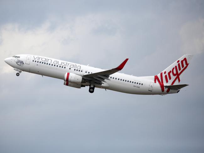 SYDNEY, AUSTRALIA - NewsWire Photos OCTOBER 08, 2020 - A Virgin Australia plane takes off at Sydney Airport on Thursday October 08, 2020.Picture: NCA NewsWire / Christian Gilles