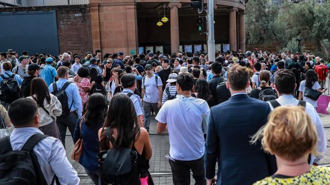 Commuters crowd outside Central Station on Wednesday after the train network ground to a halt. Picture: Getty Images