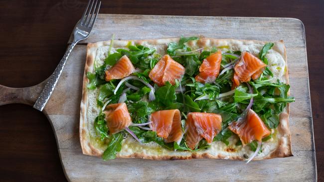 Crisp: Tarte flambe with almon, onion, capers and rocket at Le Coin Bistro. Picture: David Kelly