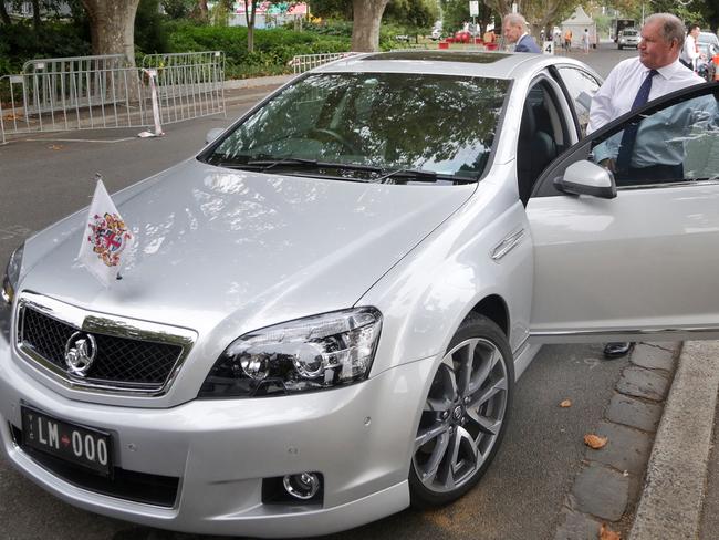 Former Lord Mayor Robert Doyle leaves by car after a press conference last year. Picture: Hamish Blair