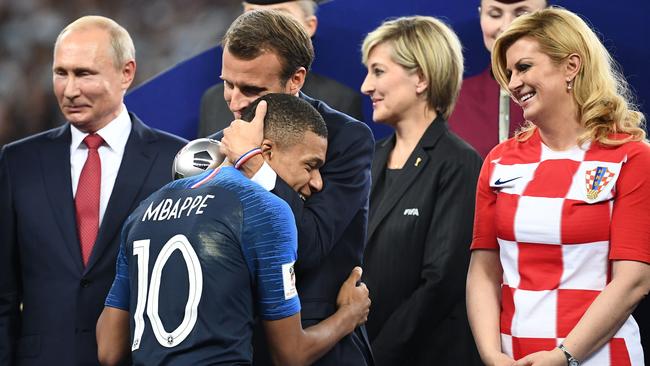 French President Emmanuel Macron congratulates France's forward Kylian Mbappe. Picture: AFP