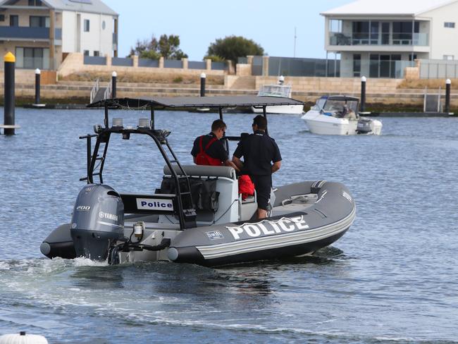 Police launch a boat off Cape Jaffa as the search continues. Picture: Simon Cross