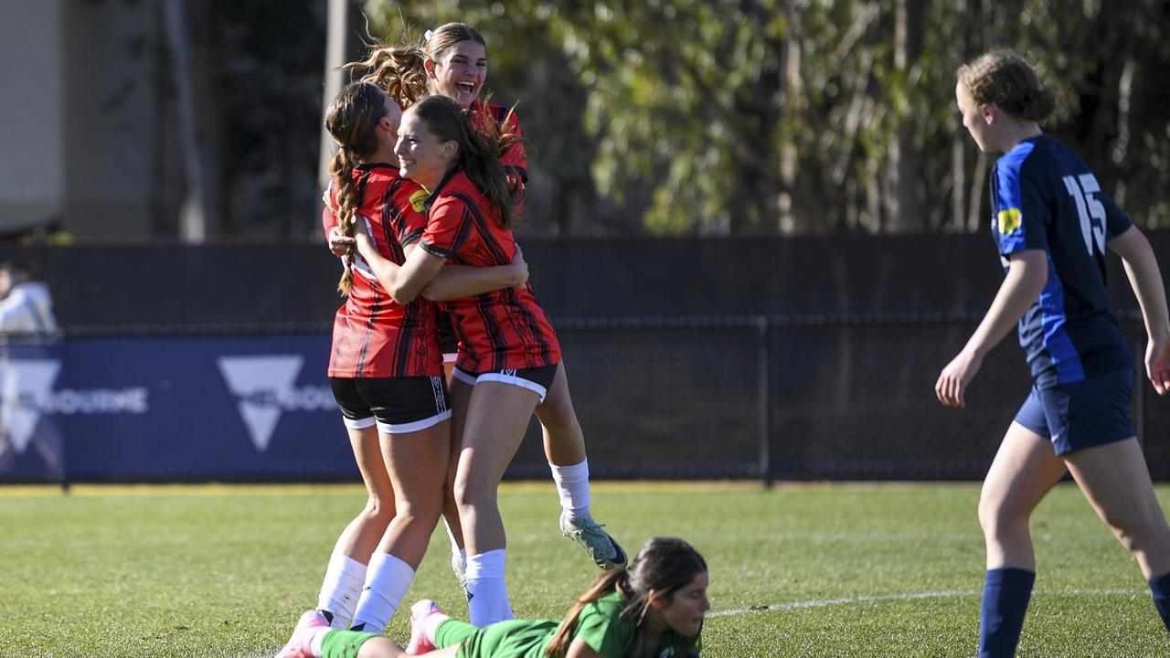 Northern NSW U16 attacker Kealah Boldery (front) celebrated with teammates during the semi-final. Picture: Mark Avellino