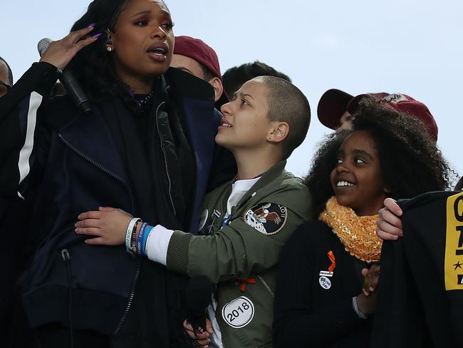 Emotional Jennifer Hudson — who lost family members for gun violence — embraces activist and Florida shooting survivor Emma Gonzalez in Washington, DC. Picture: Mark Wilson/Getty Images