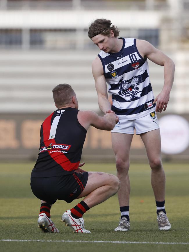 Tom Ratcliffe Lauderdale congratulates Brad Cox-Goodyer North Launceston after the game. TSL grand final 2024 - North Launceston V Lauderdale. Picture: Nikki Davis-Jones