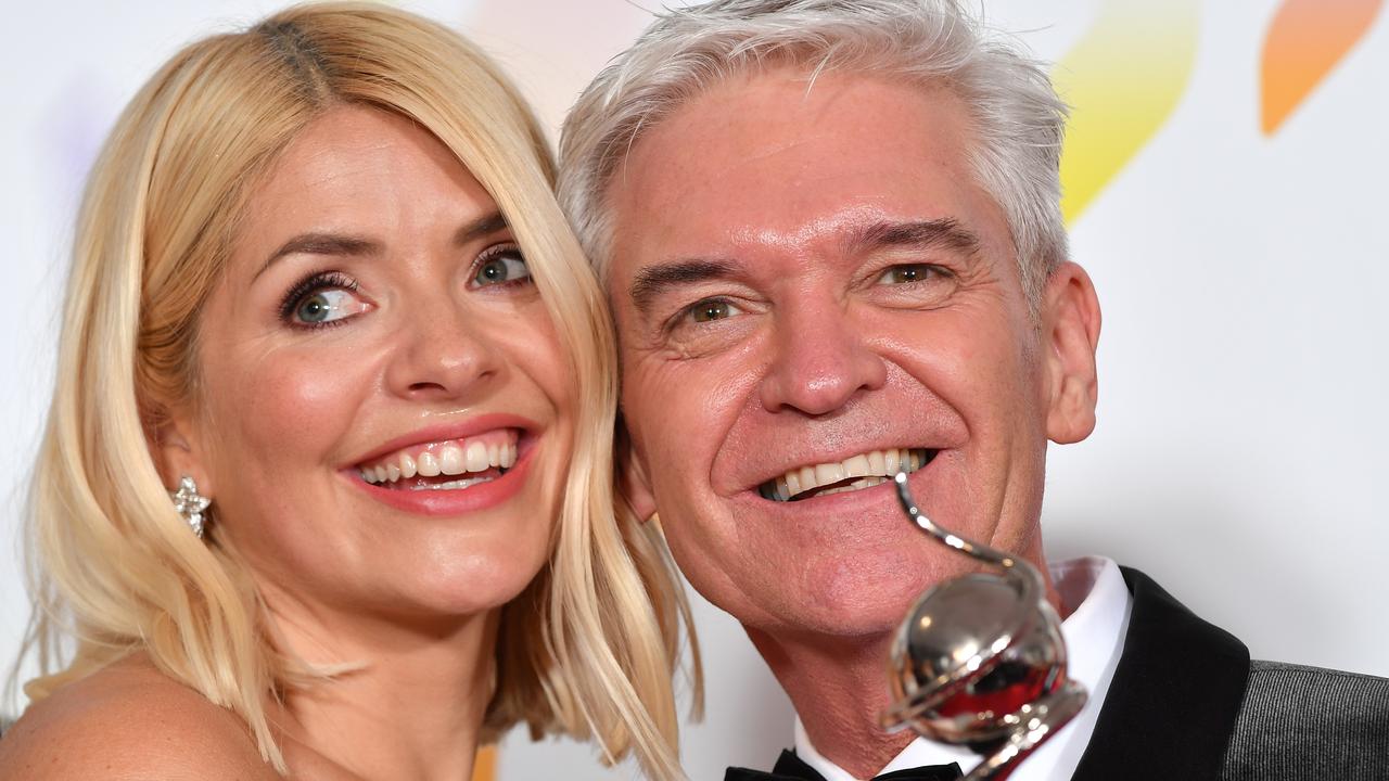 Holly Willoughby and Phillip Schofield pose with the award for Live Magazine Show for 'This Morning' at the National Television Awards 2020. Picture: Gareth Cattermole/Getty