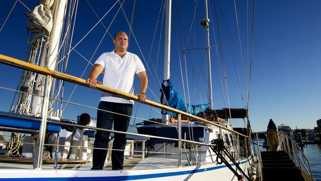 Tallship Cruises general manager Jason Nicholls standing with one of his vessels.