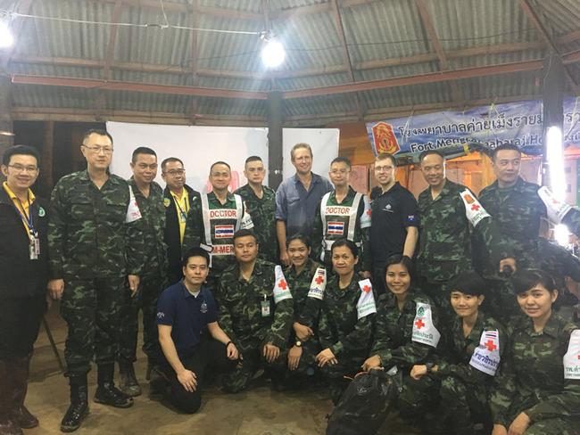 Australian Dr Richard Harris (centre), and the medical team he worked with to assist in the rescue of 12 Thai boys who were stuck in the cave with their soccer coach. Picture: AAP