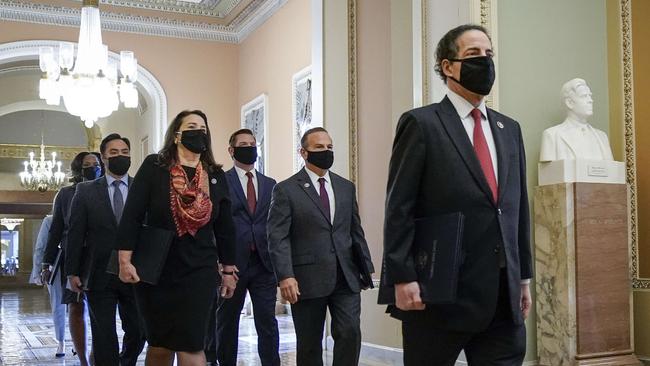 Democrat Representative Jamie Raskin and other impeachment managers walk to the Senate chamber on the first day of hearings. Picture: AFP