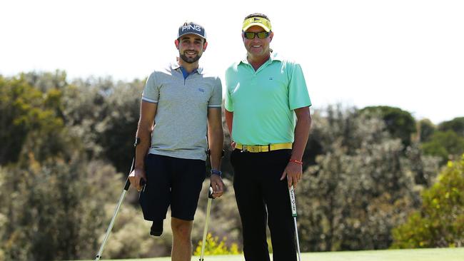 Juan Postigo with Robert Allenby. Picture: Brett Costello