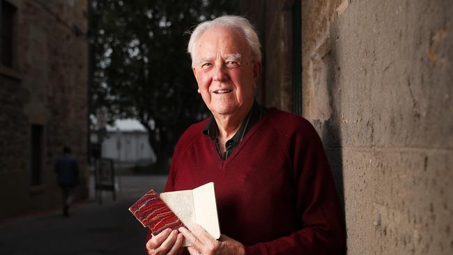 Doctor John Thorne with his uncle's WWII war diaries. Abel Seaman Sam Smith was killed when the crew of HMAS Hobart was hit by a torpedo. His war diaries have been put together and published as a book by his nephew Doctor John Thorne and his daughter Picture: Nikki Davis-Jones