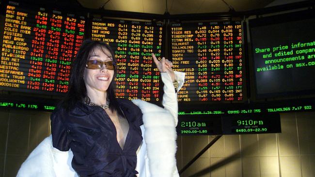 Heidi Fleiss in front of the shares list board after The Daily Planet was listed in May 2003.