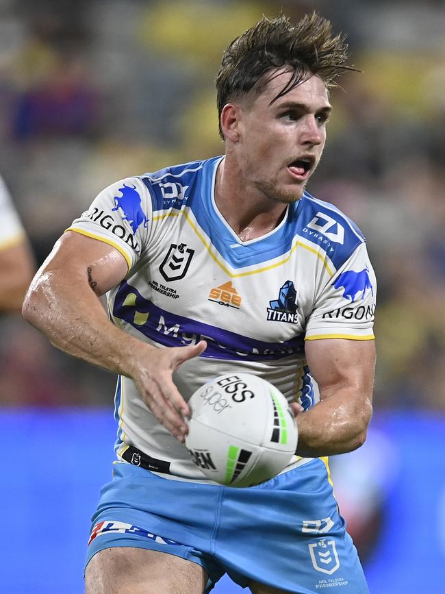 TOWNSVILLE, AUSTRALIA - APRIL 23: AJ Brimson of the Titans passes the ball during the round seven NRL match between the North Queensland Cowboys and the Gold Coast Titans at Qld Country Bank Stadium, on April 23, 2022, in Townsville, Australia. (Photo by Ian Hitchcock/Getty Images)