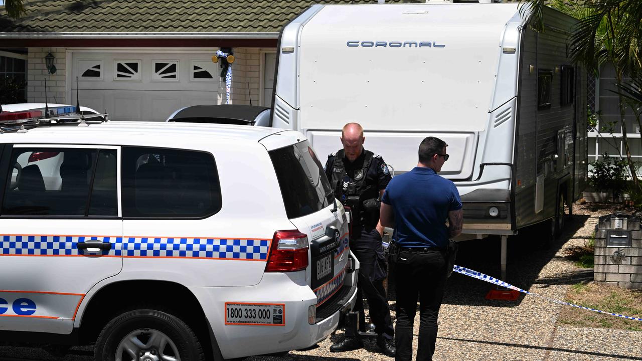 Police at a home at Bongaree where 51-year-old Janet Guthrie was found dead. Picture: Lyndon Mechielsen/Courier Mail